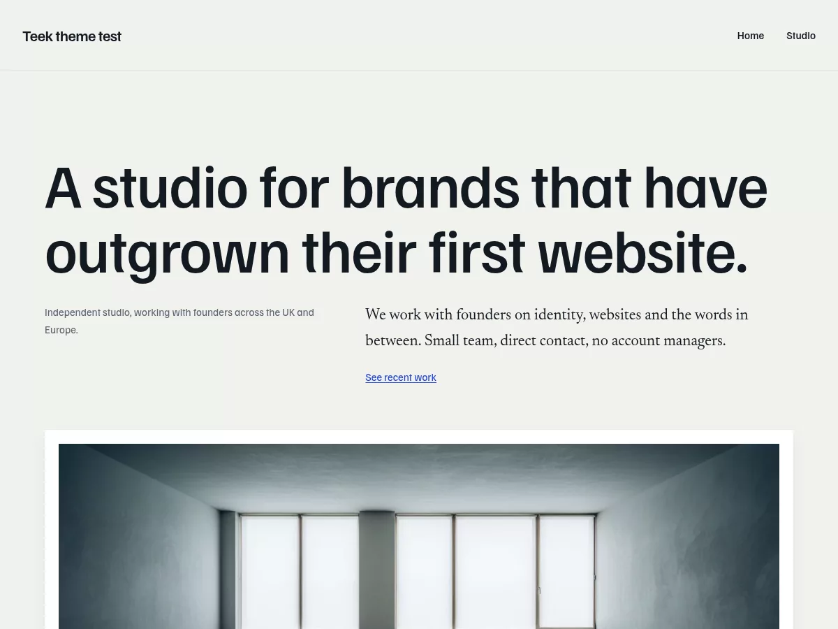 Teek WordPress theme home page: a large display headline above a wide mounted photograph.